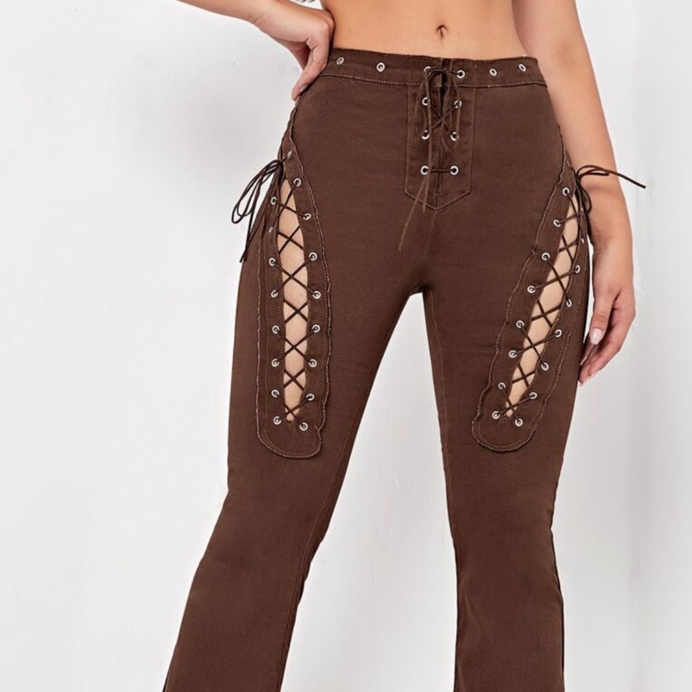 Lace Up Detail Raw Hem Flare Leg Jeans